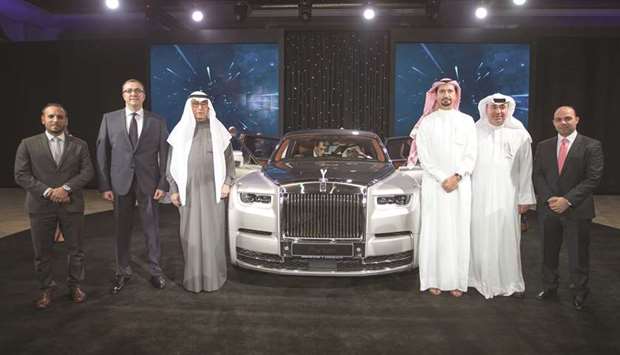 Prominent Qatari entrepreneur Hussain Alfardan with Omar Hussain Alfardan, Fahad Hussain Alfardan, Mau2019n al-Hamawi and other dignitaries at the new Rolls-Royce Phantom launch ceremony.