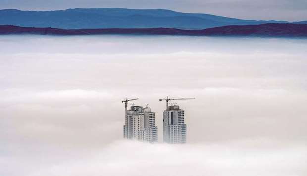 A picture taken from Vodno mountain yesterday shows the tops of some of the cityu2019s highest buildings in an area with a high level of air pollution in Skopje. Skopje was affected yesterday, for the second day in a row, by air pollution that almost paralysed the capital.
