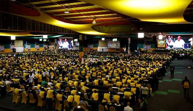 ANC members and delegates attend the 54th National Conference of the ruling African National Congress (ANC) at the Nasrec Expo Centre in Johannesburg