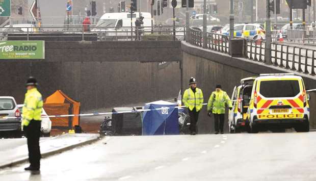 Police and emergency services are seen working at the scene of a multiple car crash on Lee Bank Middleway in central Birmingham yesterday.