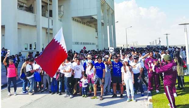 A large number of Filipino expatriates took part in the 2km fun run dubbed as u201cTakbo Handog sa Qatar (Run for Qatar)u201d to mark QND yesterday at the Al Rayyan Sports Complex's oval track. PICTURE: Joey Aguilar