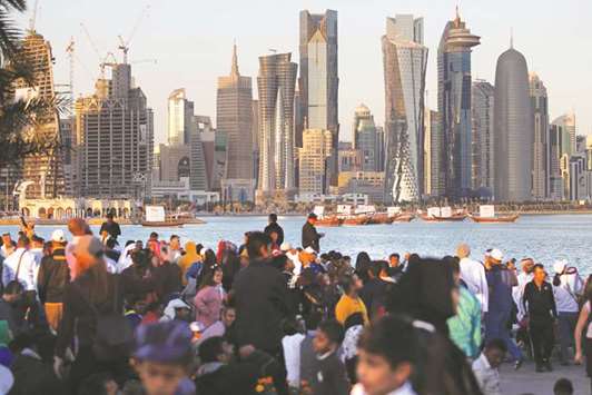 People take part in Qatar National Day celebrations at the Doha Corniche  yesterday. The 2018 budget increases total spending by 2.4% year-on-year to QR203.2bn.