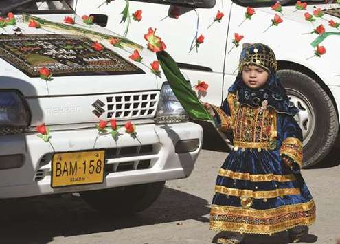 Children take part in processions in Karachi