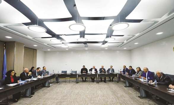 Members of the delegation of the Syrian Negotiation Commission (SNC) attend a meeting with United Nations Deputy Special Envoy for Syria Ramzy Ezzeldin Ramzy during the talks in Geneva, yesterday.
