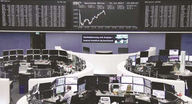 Traders at the Frankfurt Stock Exchange. The DAX 30 added 0.3% to 13,109.74 points yesterday.