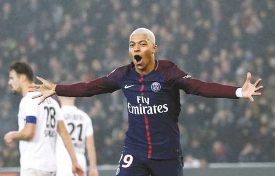 Paris Saint-Germainu2019s Kylian Mbappe celebrates after scoring against Caen during their Ligue 1 match in Paris on Wednesday. (Reuters)