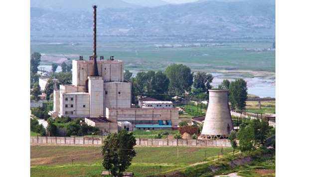 A North Korean nuclear plant is seen before demolishing a cooling tower (right) in Yongbyon, in this photo taken on June 27, 2008.