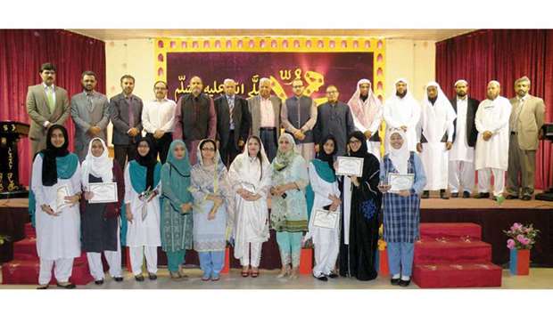 GROUP: Winners with the chief guest, school management, and judges.