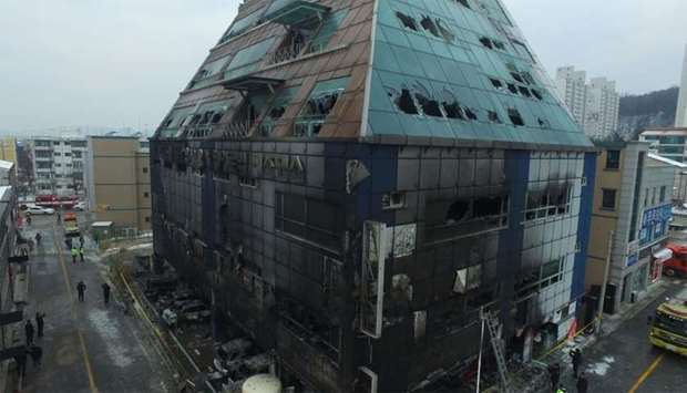 Eight-storey building damaged in a blaze which killed 29 people and injured 29 others in the southern city of Jecheon