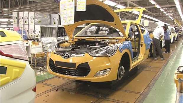 Workers at a Hyundai Veloster plant in Ulsan, South Korea. South Koreans work 2,069 hours a year, the second-most among Organisation for Economic Co-operation and Development members after Mexico.