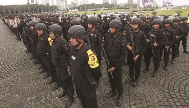  This picture taken on December 21 shows Indonesian police officers gathering for a Christmas deployment ceremony in Jakarta.
