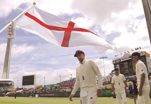Englandu2019s captain Joe Root leads his team onto the ground at the start of the fourth day of the third Ashes Test against Australia in Perth this past Sunday. (Reuters)