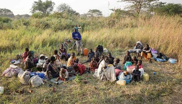 A group of South Sudanese refugees fleeing from recent fighting in Lasu in South Sudan