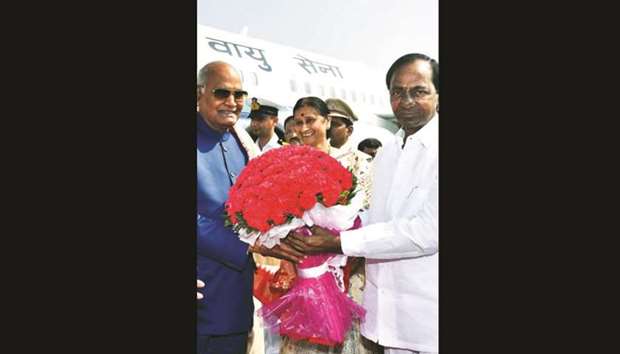 Telangana Chief Minister K Chandrasekhar Rao receives President Ram Nath Kovind on his arrival at the Hakimpet Air Force Station in Hyderabad yesterday. This is also the first southern visit of Kovind after he assumed the highest office.