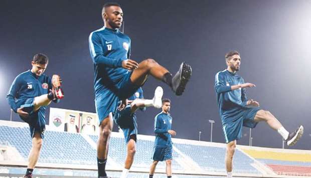 Qatar players train ahead of their match against Iraq in Kuwait yesterday.