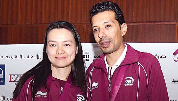 Qatar Grand Master Mohamed al-Modiahki and his wife Grand Master Zhu Chen.