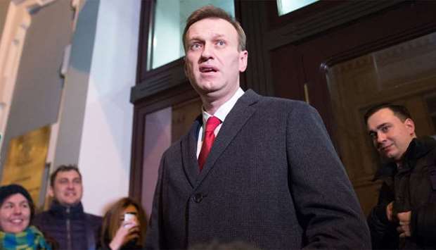 Russian opposition leader Alexei Navalny speaks to the media