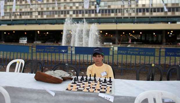 A chess player looks at the board during a game