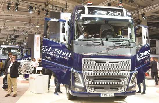 Visitors surround a Volvo FH16 truck at the booth of Swedish truck maker Volvo at the IAA truck show in Hanover. Chinau2019s Geely is buying an 8.2% stake in Swedish truckmaker AB Volvo from activist investor Cevian Capital, worth around $3.3bn at current market prices.
