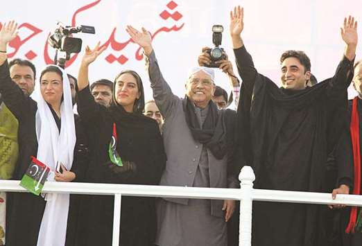 From right: Bilawal Bhutto Zardari, son of assassinated former prime minister Benazir Bhutto, waves alongside his father Asif Ali Zardari, and sisters Bakhtawar Bhutto Zardari and Aseefa Bhutto, during Benaziru2019s death anniversary in Garhi Khuda Bakhsh yesterday.