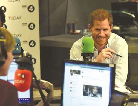 Prince Harry reacts as he guest edits the BBCu2019s Radio 4 Today programme, in London yesterday.
