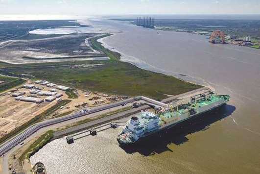 An LNG carrier sits docked at the Cheniere Energy terminal in this aerial photograph taken over Sabine Pass, Texas (file). LNG shipments from the US totalled 407,325 metric tonnes in November, up from nothing the same month a year earlier and 57% from October, placing one of the worldu2019s newest LNG sellers as the third-biggest supplier to China, behind stalwarts Qatar and Australia.