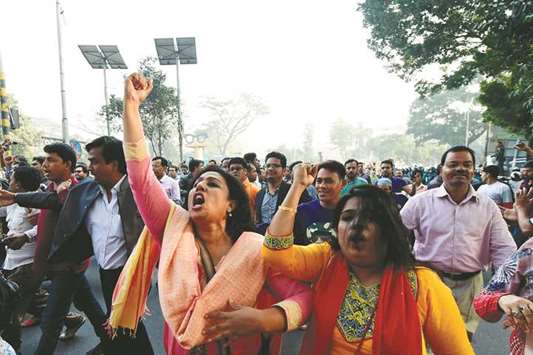 Supporters shout slogans as Bangladeshu2019s main opposition leader and BNP chairperson Khaleda Zia leaves after a court appearance in Dhaka recently. The former prime minister appeared before Dhakau2019s Special Judgeu2019s Court in the case, which accuses her of embezzling Bangladesh 31.5mn taka ($396,000) from the Zia Charitable Trust.