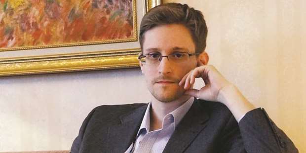 Former intelligence contractor Edward Snowden poses for a photo during an interview in an undisclosed location in December 2013 in Moscow, Russia. Snowden revealed the extent to which the US government searches and reads the e-mail of millions of people.