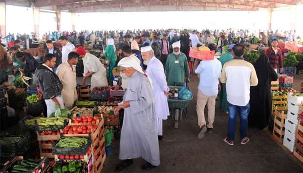 A view of the busy vegetable market at the Central Market in Abu Hamour