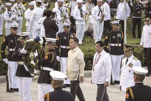 President Rodrigo Duterte attends the commemoration of the 121st death anniversary of the countryu2019s national hero Jose Rizal at the Rizal Monument in Manila yesterday.