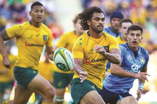 Wallabies star Karmichael Hunt (foreground).