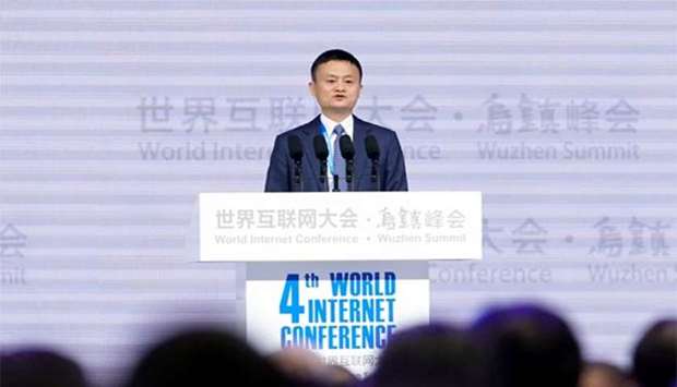 Alibaba Group Executive Chairman Jack Ma attends the opening ceremony of the fourth World Internet Conference in Wuzhen on Sunday.