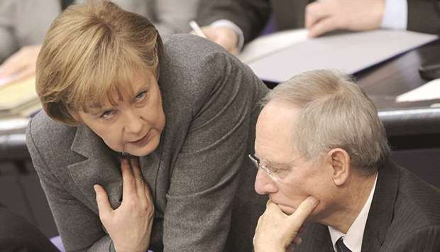 Merkel with Schaeuble: the former finance minister says that a stable alliance between the conservatives and SPD would be preferable.