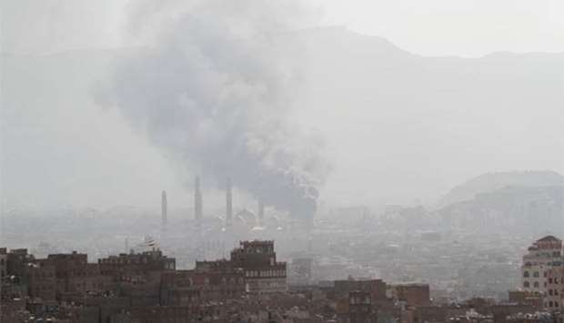 Smoke rises during the battle between former Yemeni president Ali Abdullah Saleh's supporters and the Houthi fighters in Sanaa, on Saturday.