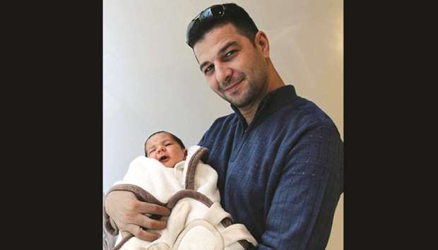 Baby Yassim Ahmed Abdelsalm with his father Ahmed Abdelsalm.