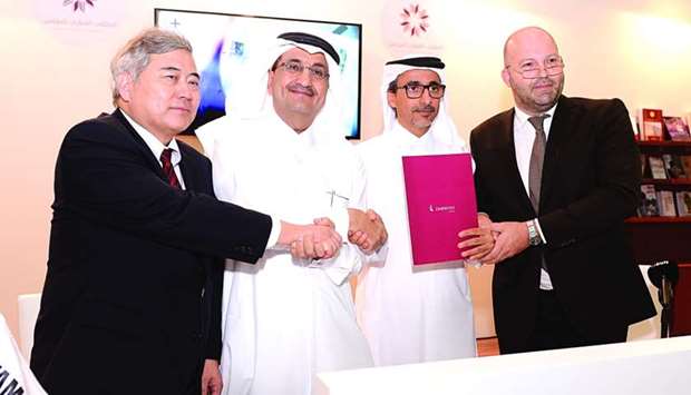 (From left) Japanese ambassador Seiichi Otsuka, Fifty One East chairman and managing director Bader al-Darwish, Qataru2019s Minister of Culture and Sports HE Salah bin Ghanem al-Ali and French embassyu2019s cultural counsellor Olivier Deseez after signing an agreement to support local musicians and artistes at the Doha International Book Fair at DECC. PICTURE: Shaji Kayamkulam.