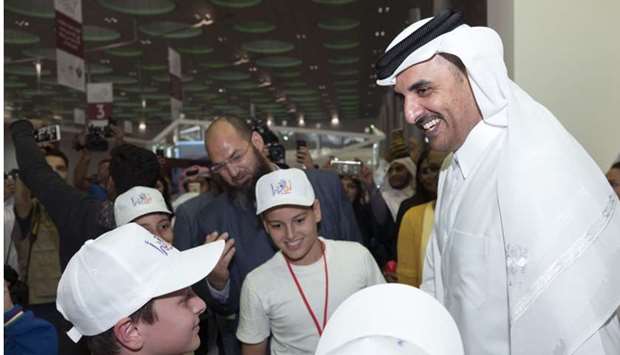 His Highness the Emir Sheikh Tamim bin Hamad al-Thani visited yesterday the 28th Doha International Book Fair at Doha Exhibition and Convention Centre. His Highness toured the pavilions of the exhibition where he was briefed on the participation of the government organisations, the cultural sectors, and also the Arabic and international publishing houses, as well as the latest publications, books and manuscripts displayed in the exhibition, which is being held under the slogan of ,towards a knowledgeable society,