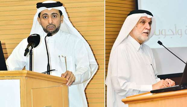 Dr Hassan al-Derham (left) and Dr Darwish al-Emadi speak at the event.