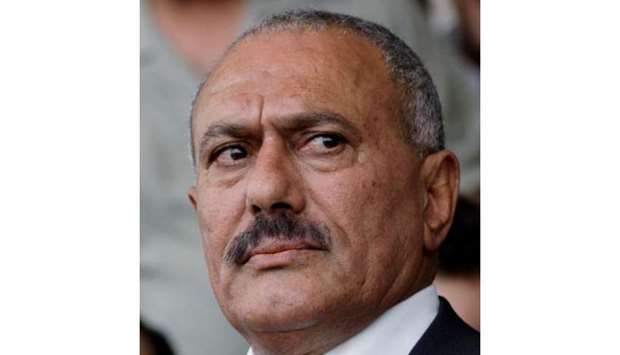 Yemen's then President Ali Abdullah Saleh looks on during a rally of supporters in Sanaa April 1, 2011