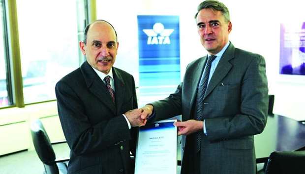 Qatar Airways Group chief executive Akbar al-Baker receiving the IEnvA Stage 2 certificate from Alexandre de Juniac, director general and CEO of IATA, during al-Bakeru2019s inaugural meeting as the new chair-elect of IATAu2019s Board of Governors in Geneva on Friday.