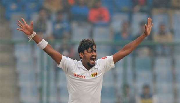 Sri Lanka bowler Suranga Lakmal celebrates after dismissing India's Murali Vijay on the fourth day of third Test between India and Sri Lanka at the Feroz Shah Kotla Stadium in New Delhi on Tuesday.