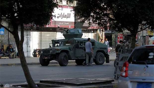 A military vehicle used by Houthi fighters is seen on a street near Tahrir Square after Yemen's former president Ali Abdullah Saleh was killed in Sanaa on Monday.