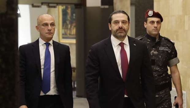 Lebanese Prime Minister Saad Hariri (C) arrives to attend a cabinet meeting at the presidential palace of Baabda, east of the capital Beirut.