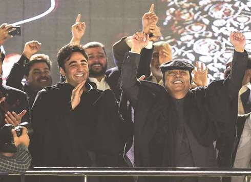 PPPu2019s Asif Ali Zardari and his son Bilawal Bhutto take part in a rally yesterday to mark the partyu2019s 50th anniversary in Islamabad. The PPP was founded by former prime minister Zulfiqar Ali Bhutto on  November 30, 1967. Sources have said that the PPP and the ruling PML-N have agreed to set aside their public differences, privately at least, to protect key joint interests.