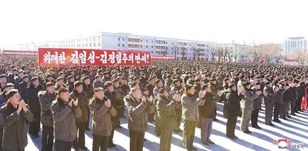 People applaud during one of the civilian-army joint meetings to celebrate North Koreau2019s nuclear progress in Pyongyang.