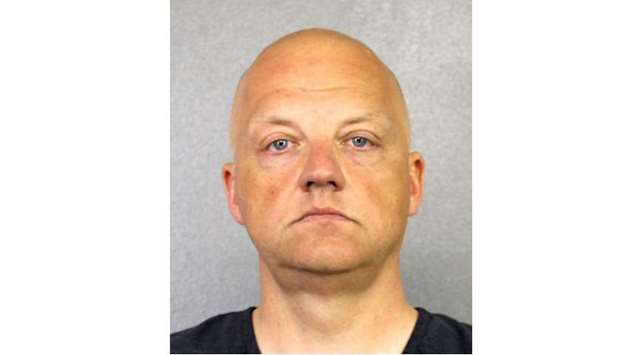 Volkswagen executive Oliver Schmidt, charged with conspiracy to defraud the United States over the company's diesel emissions scandal is shown in this booking photo in Fort Lauderdale, Florida, US, provided on January 9, 2017.