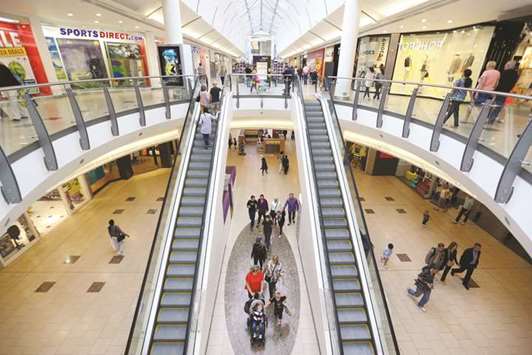 Shoppers pass through Lakeside shopping centre, operated by Intu Properties, in Thurrock. Including assumed debt, the Hammerson deal values Intu at about $10.9bn, making it the biggest-ever acquisition of a UK real estate company, according to data compiled by Bloomberg.