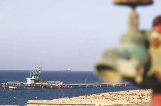 A general view of the Hariqa oil port and loading installation in Tobruk, Libya. Output in Libya u2013 where oil fields have endured sporadic shutdowns and disruptions due to protests, power blackouts and security issues u2013 rose to about 1mn bpd this year, the highest level in four years.