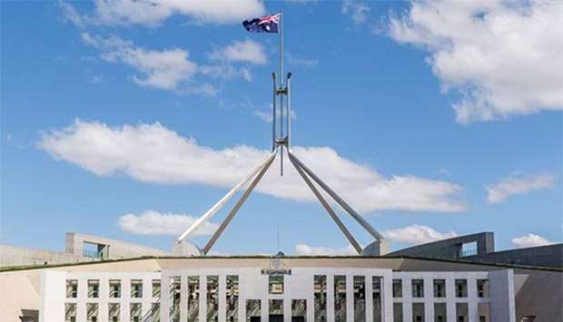 Australian Parliament is due to debate a Labor proposal to send the cases of another nine lawmakers to the High Court.