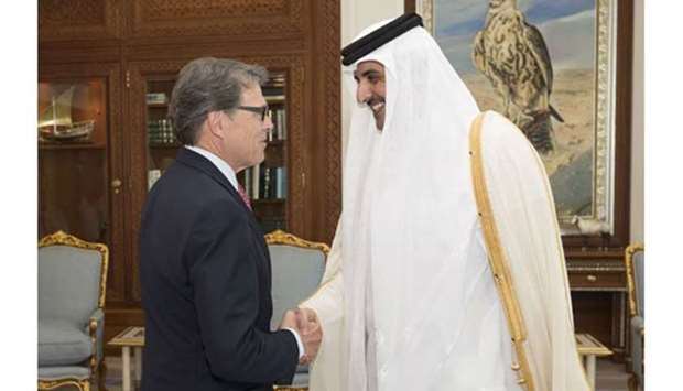 His Highness the Emir Sheikh Tamim bin Hamad al-Thani shakes hands with US Energy Secretary Rick Perry at the Emiri Diwan on Thursday.
